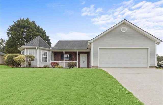 ranch-style home featuring covered porch, a garage, and a front lawn