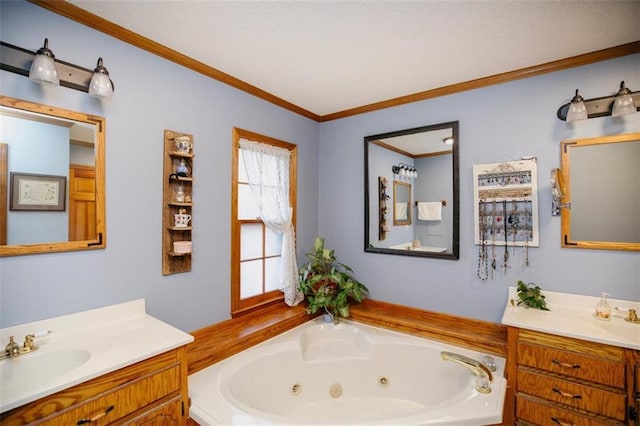 bathroom featuring a sink, two vanities, a jetted tub, and ornamental molding