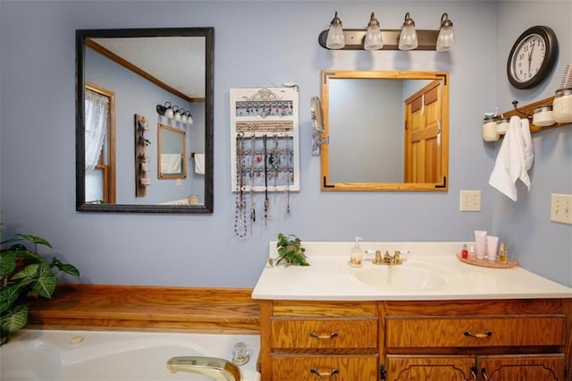 full bath with a bath, vanity, and crown molding