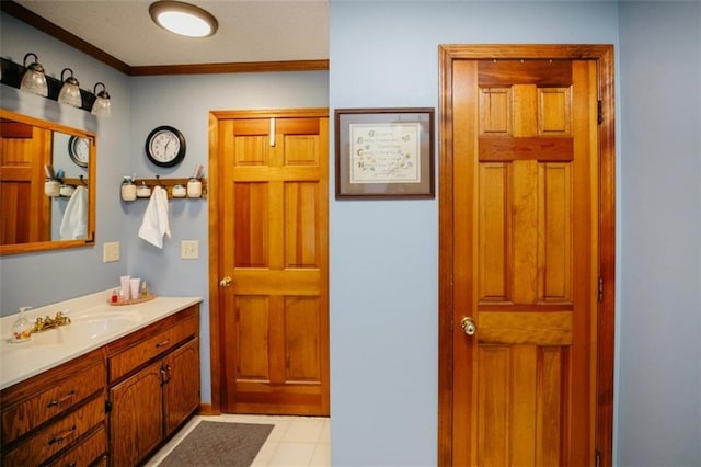 bathroom featuring vanity and ornamental molding