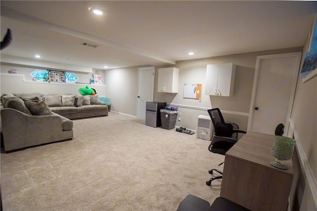 office area with recessed lighting, visible vents, and light colored carpet