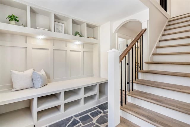 mudroom featuring arched walkways