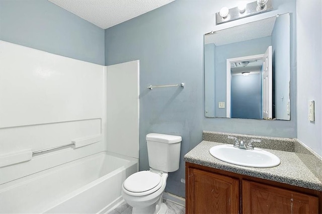 full bathroom featuring a textured ceiling,  shower combination, vanity, and toilet