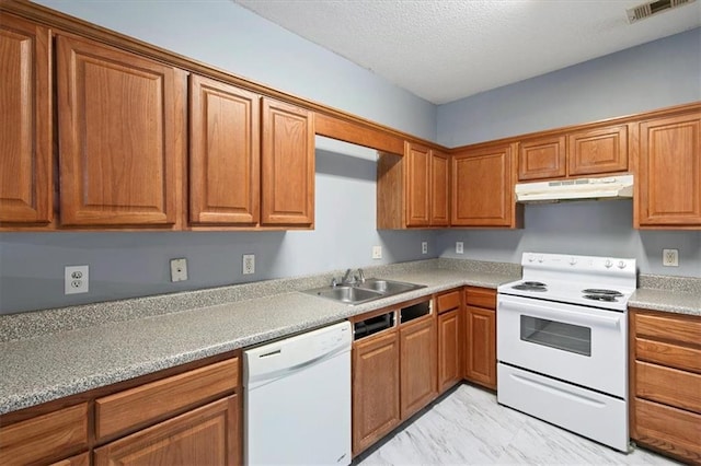 kitchen with white appliances and sink