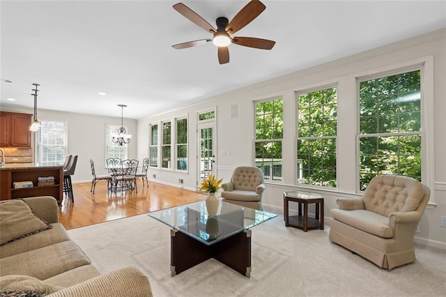 1215 Renaissance Ct SE, Mableton, GA 30126 - living area featuring a ceiling fan, a chandelier, recessed lighting, and light wood-style flooring
