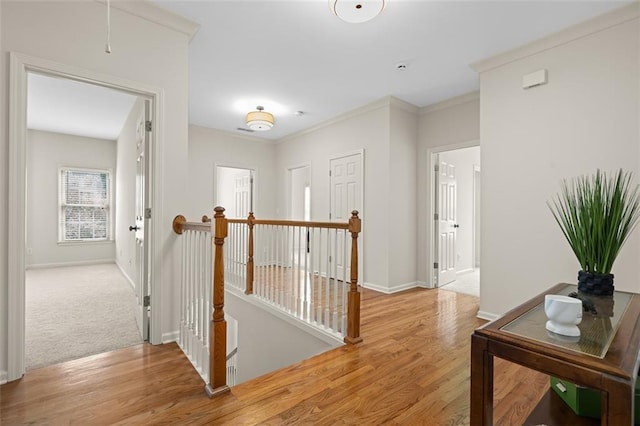 1215 Renaissance Ct SE, Mableton, GA 30126 - corridor with an upstairs landing, wood finished floors, and ornamental molding