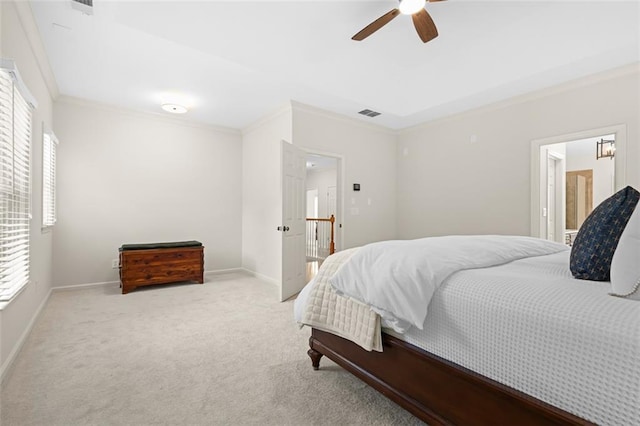 1215 Renaissance Ct SE, Mableton, GA 30126 - carpeted bedroom featuring ornamental molding, multiple windows, and a ceiling fan