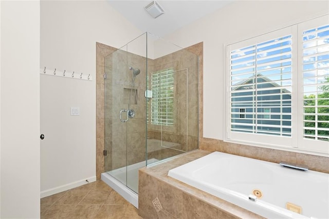 1215 Renaissance Ct SE, Mableton, GA 30126 - bathroom featuring a jetted tub, a stall shower, and tile patterned floors