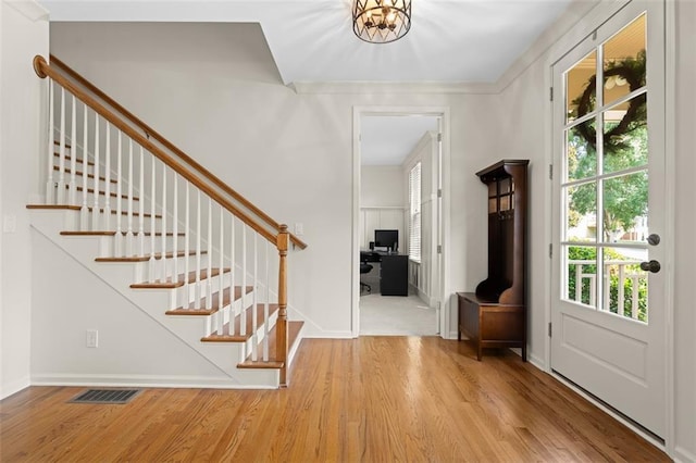1215 Renaissance Ct SE, Mableton, GA 30126 - entryway featuring wood finished floors, stairs, and a chandelier