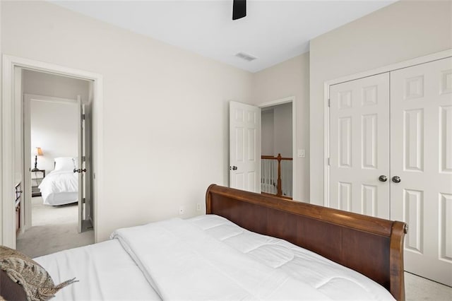1215 Renaissance Ct SE, Mableton, GA 30126 - carpeted bedroom featuring a closet and ceiling fan