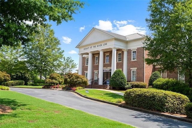 1215 Renaissance Ct SE, Mableton, GA 30126 - view of front of house with a front lawn and brick siding