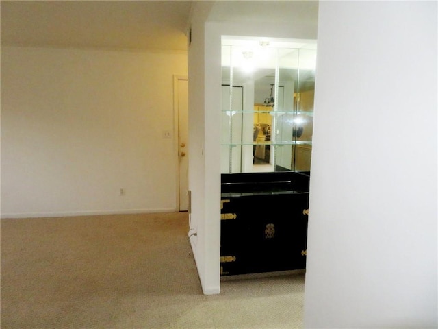 5586 Kingsport Dr, Atlanta, GA 30342 - hallway featuring light colored carpet