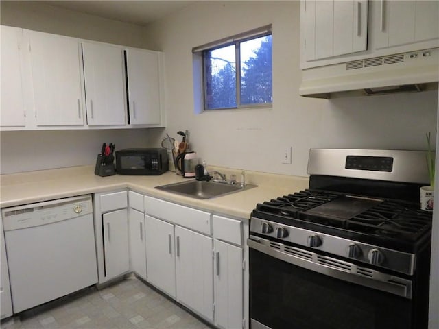 5586 Kingsport Dr, Atlanta, GA 30342 - kitchen with stainless steel range with gas cooktop, sink, white cabinets, and dishwasher