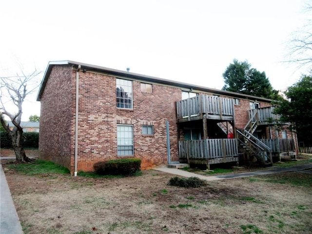 5586 Kingsport Dr, Atlanta, GA 30342 - back of house featuring a deck
