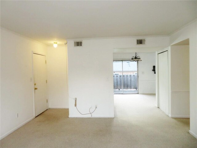 5586 Kingsport Dr, Atlanta, GA 30342 - carpeted empty room featuring ornamental molding