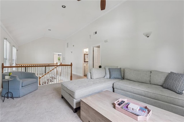 183 Whitefoord Ave NE, Atlanta, GA 30307 - living room with ceiling fan, healthy amount of natural light, crown molding, carpet flooring, and high vaulted ceiling