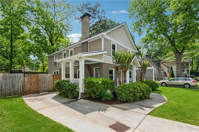 183 Whitefoord Ave NE, Atlanta, GA 30307 - view of home's exterior featuring covered porch and a chimney