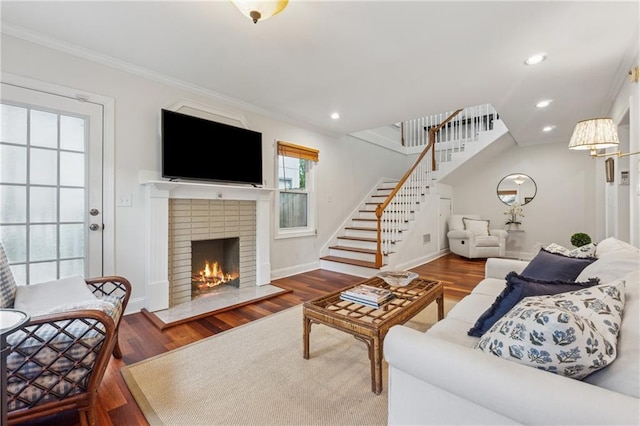 183 Whitefoord Ave NE, Atlanta, GA 30307 - living area featuring stairs, crown molding, wood finished floors, a fireplace, and recessed lighting