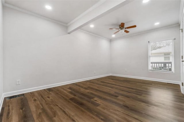 spare room featuring baseboards and dark wood-style flooring