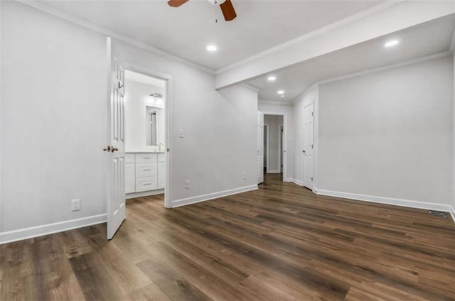 unfurnished bedroom featuring recessed lighting, connected bathroom, baseboards, and dark wood-style floors