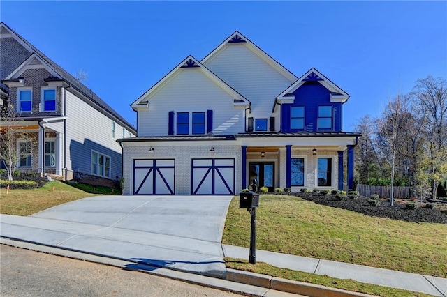 craftsman-style home featuring a garage and a front yard