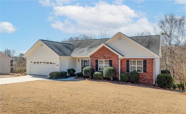 single story home with a garage, concrete driveway, brick siding, and a front lawn