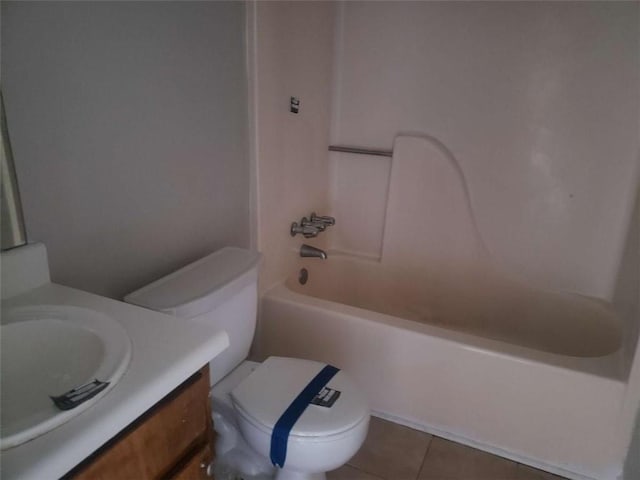 full bathroom with tile patterned flooring, vanity, shower / bath combination, and toilet