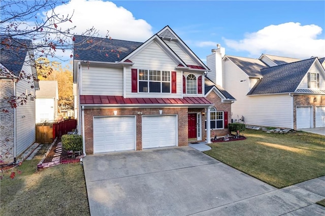 view of front facade featuring a garage and a front yard