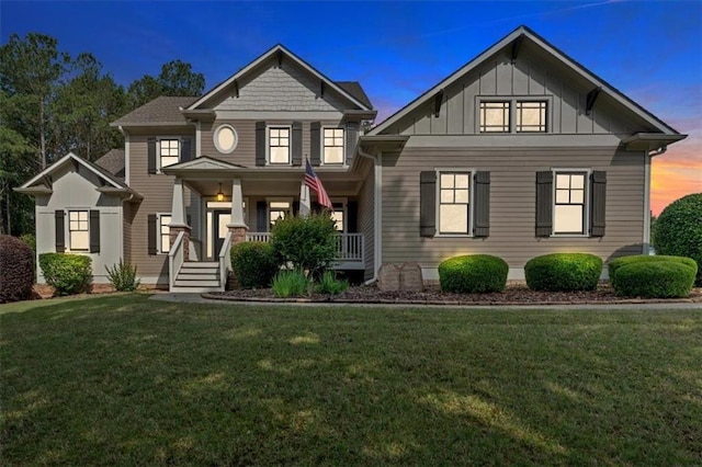 87 Washington Blvd, Dallas, GA 30132 - craftsman-style house with board and batten siding, a porch, and a yard