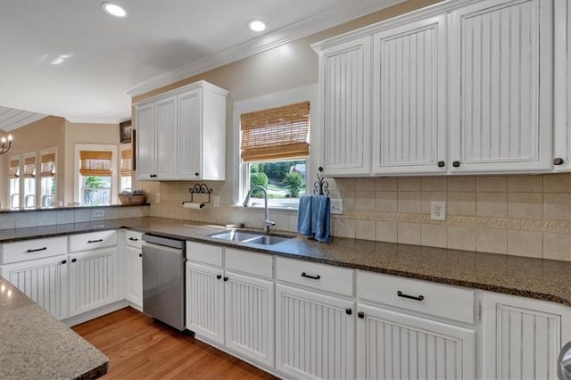 87 Washington Blvd, Dallas, GA 30132 - kitchen with a sink, dishwasher, ornamental molding, decorative backsplash, and white cabinets