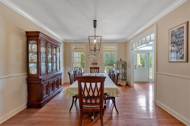 87 Washington Blvd, Dallas, GA 30132 - dining area with wood finished floors, a wainscoted wall, and crown molding