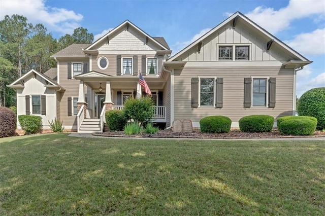 87 Washington Blvd, Dallas, GA 30132 - craftsman-style home featuring board and batten siding, a porch, and a front lawn