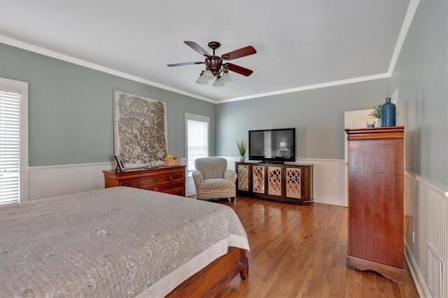 87 Washington Blvd, Dallas, GA 30132 - bedroom with wainscoting, wood finished floors, ornamental molding, and a ceiling fan