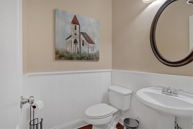 87 Washington Blvd, Dallas, GA 30132 - half bath with wainscoting, a sink, and toilet