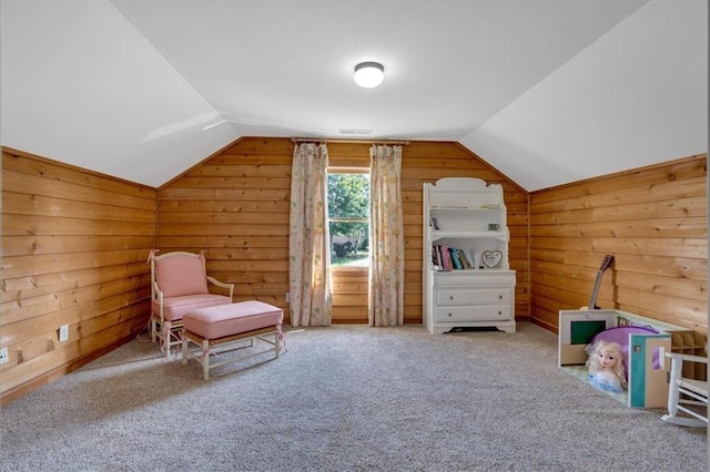 87 Washington Blvd, Dallas, GA 30132 - sitting room with lofted ceiling, wooden walls, and carpet floors