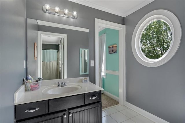 87 Washington Blvd, Dallas, GA 30132 - bathroom featuring healthy amount of natural light, ornamental molding, vanity, tile patterned floors, and baseboards