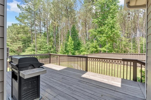 87 Washington Blvd, Dallas, GA 30132 - wooden terrace with grilling area and a fenced backyard