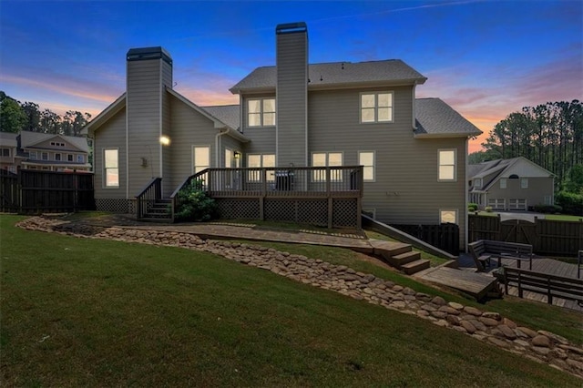 87 Washington Blvd, Dallas, GA 30132 - back of property featuring a wooden deck and a chimney