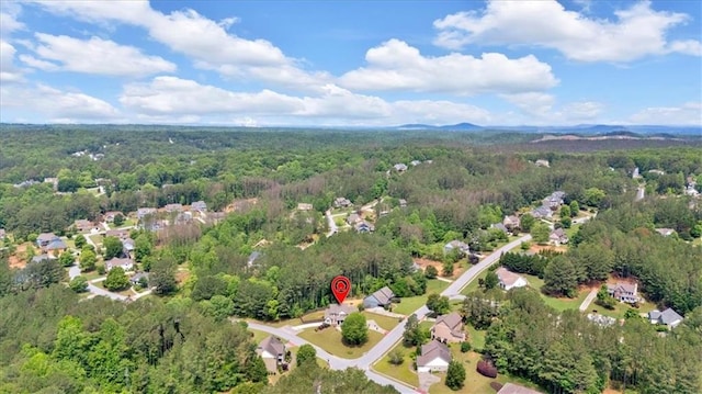87 Washington Blvd, Dallas, GA 30132 - aerial view of property and surrounding area with a heavily wooded area