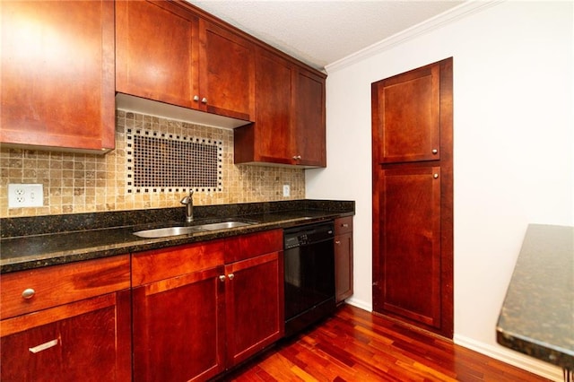 kitchen with decorative backsplash, dark stone counters, crown molding, sink, and dishwasher