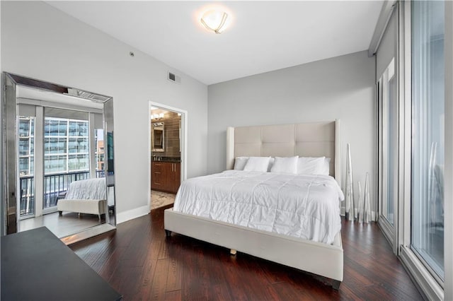 1080 Peachtree St NE Unit 2710, Atlanta, GA 30309 - bedroom with access to exterior, wood finished floors, and connected bathroom
