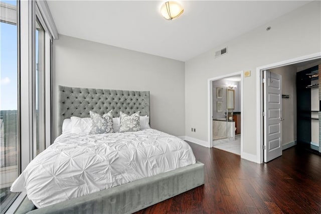 1080 Peachtree St NE Unit 2710, Atlanta, GA 30309 - bedroom with wood finished floors and baseboards