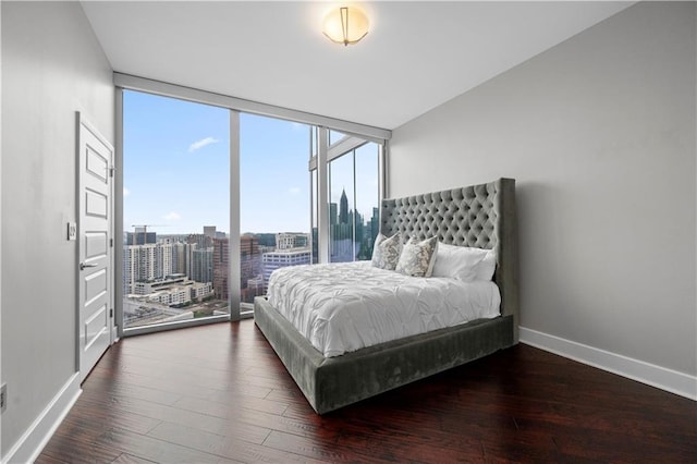 1080 Peachtree St NE Unit 2710, Atlanta, GA 30309 - bedroom with hardwood / wood-style floors, a wall of windows, access to outside, and a view of city
