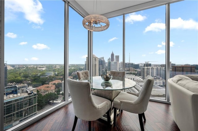 1080 Peachtree St NE Unit 2710, Atlanta, GA 30309 - sunroom featuring a city view and a chandelier