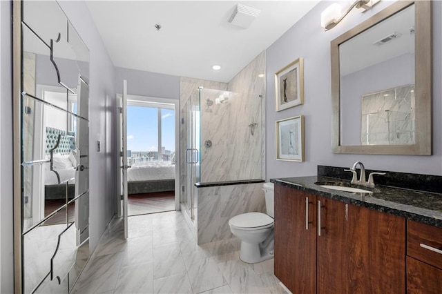 1080 Peachtree St NE Unit 2710, Atlanta, GA 30309 - bathroom featuring vanity, marble look tiles, a marble finish shower, and ensuite bathroom