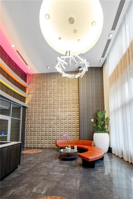 1080 Peachtree St NE Unit 2710, Atlanta, GA 30309 - community lobby with wallpapered walls and recessed lighting