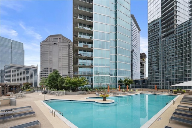 1080 Peachtree St NE Unit 2710, Atlanta, GA 30309 - community pool with a view of city and a patio area