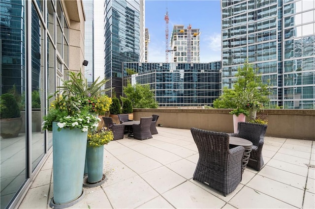 1080 Peachtree St NE Unit 2710, Atlanta, GA 30309 - view of patio with a city view