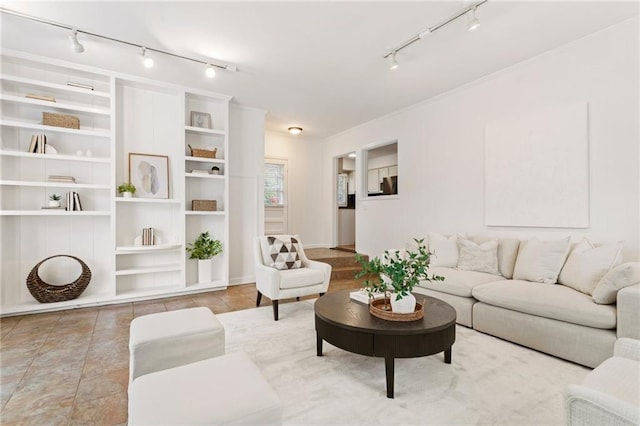 living room with light tile patterned floors and built in features