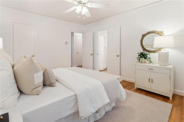 bedroom featuring ceiling fan and light wood-type flooring